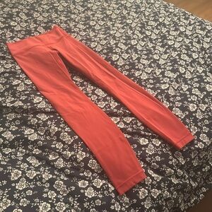 Pink lululemon size 2 leggings. No tags. No dance. Hit at ankle and I’m 5’5”